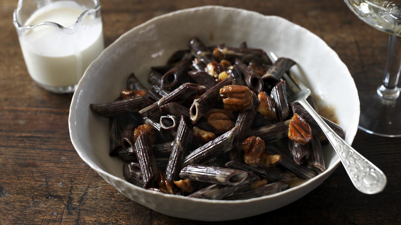 Chocolate pasta with caramel and pecans