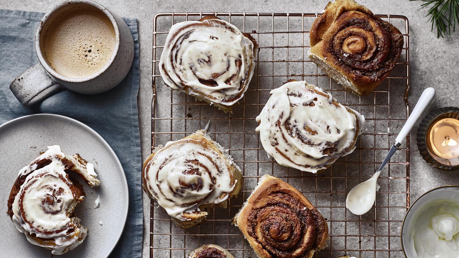 Fluffy cinnamon rolls smothered in cream cheese frosting are an American cl...