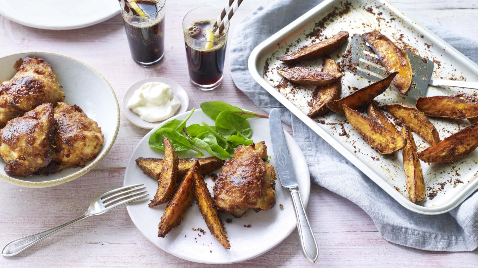 Crispy chicken with sweet potato fries and barbecue beans