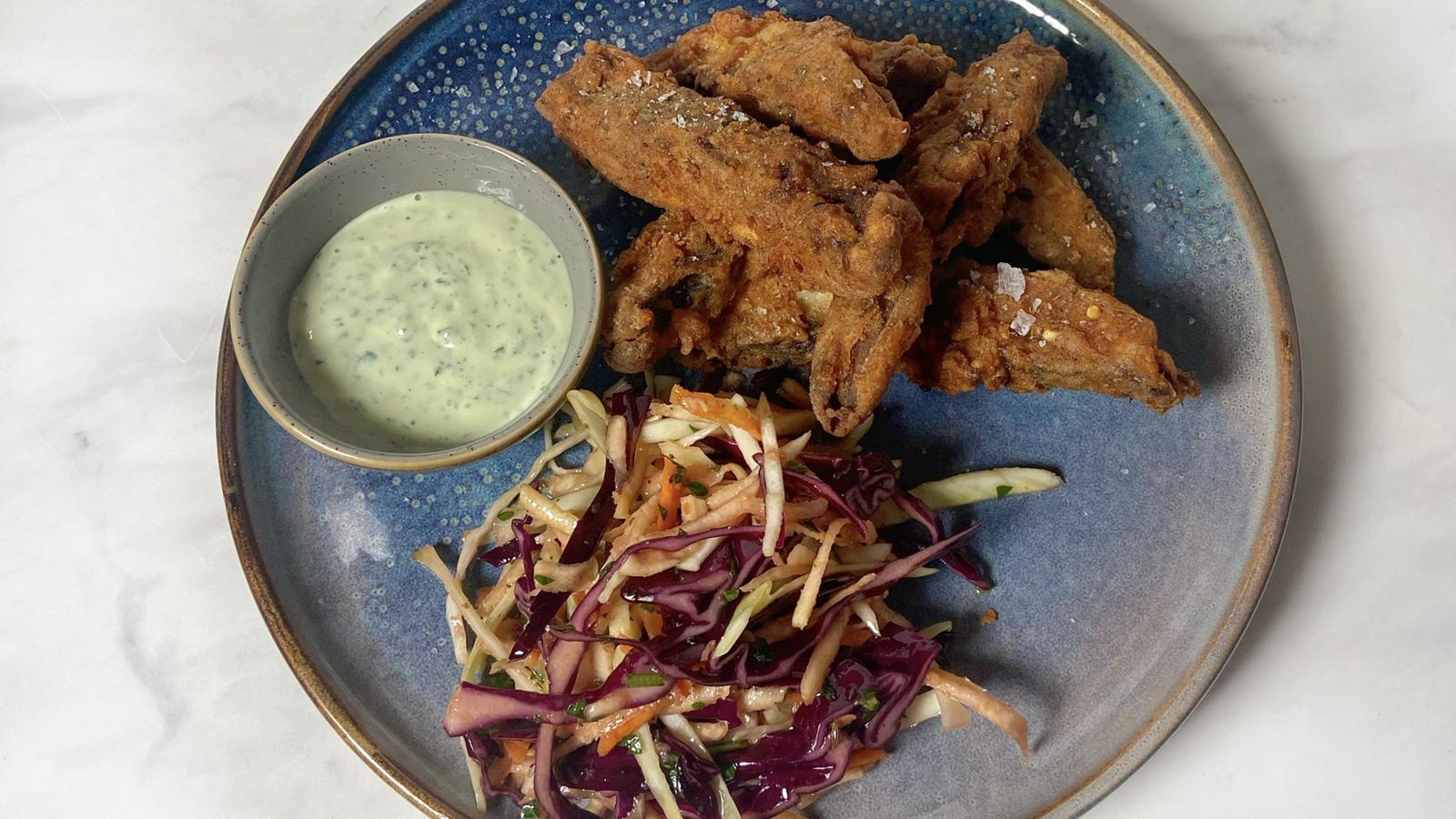 Crispy coated mushrooms with green dip and slaw