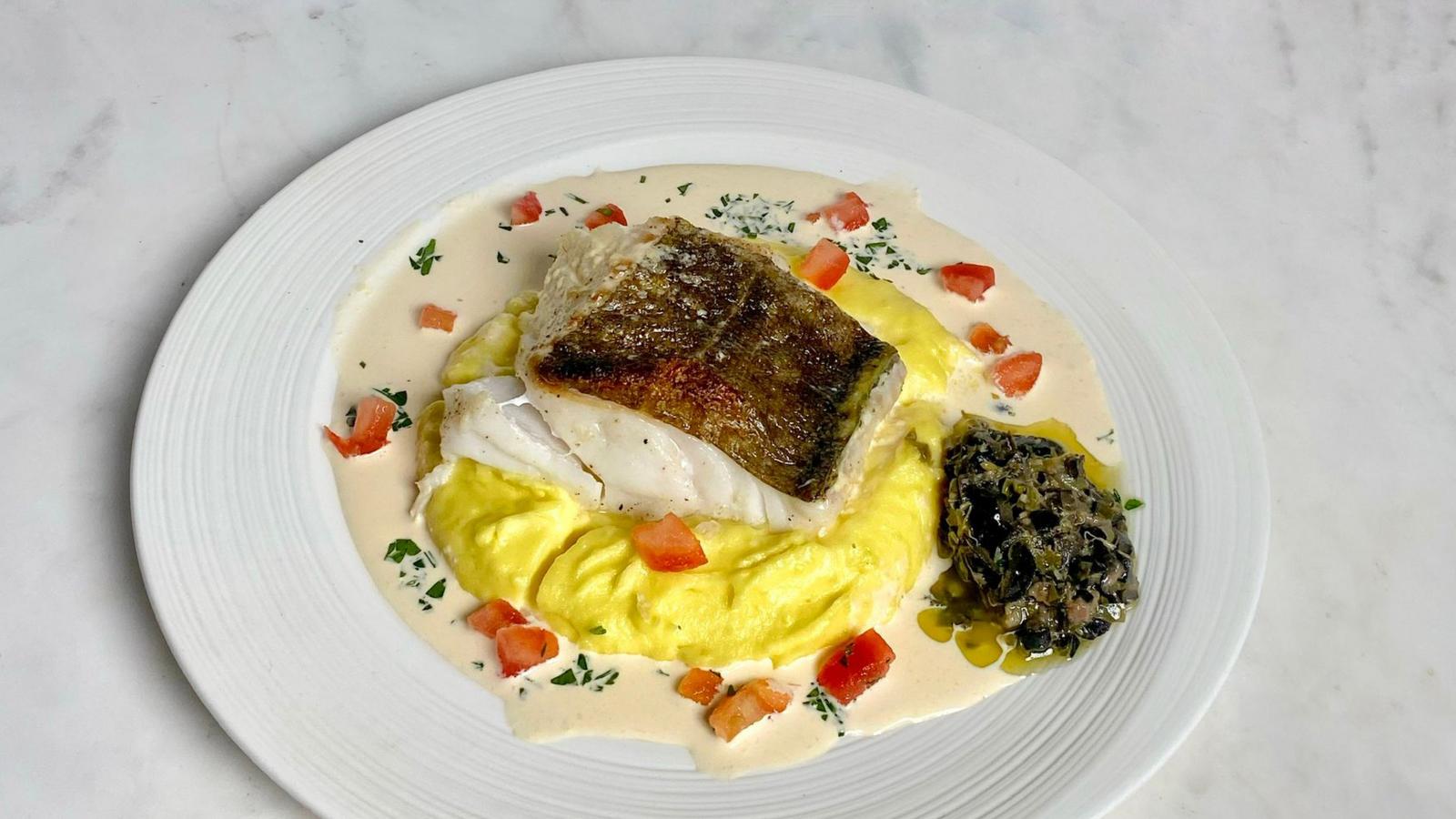 Fillet of cod with saffron mashed potatoes and olive tapenade