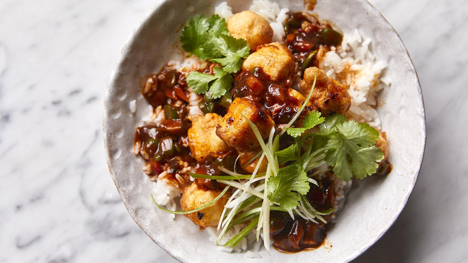 Fried tofu with mushroom sauce on rice 