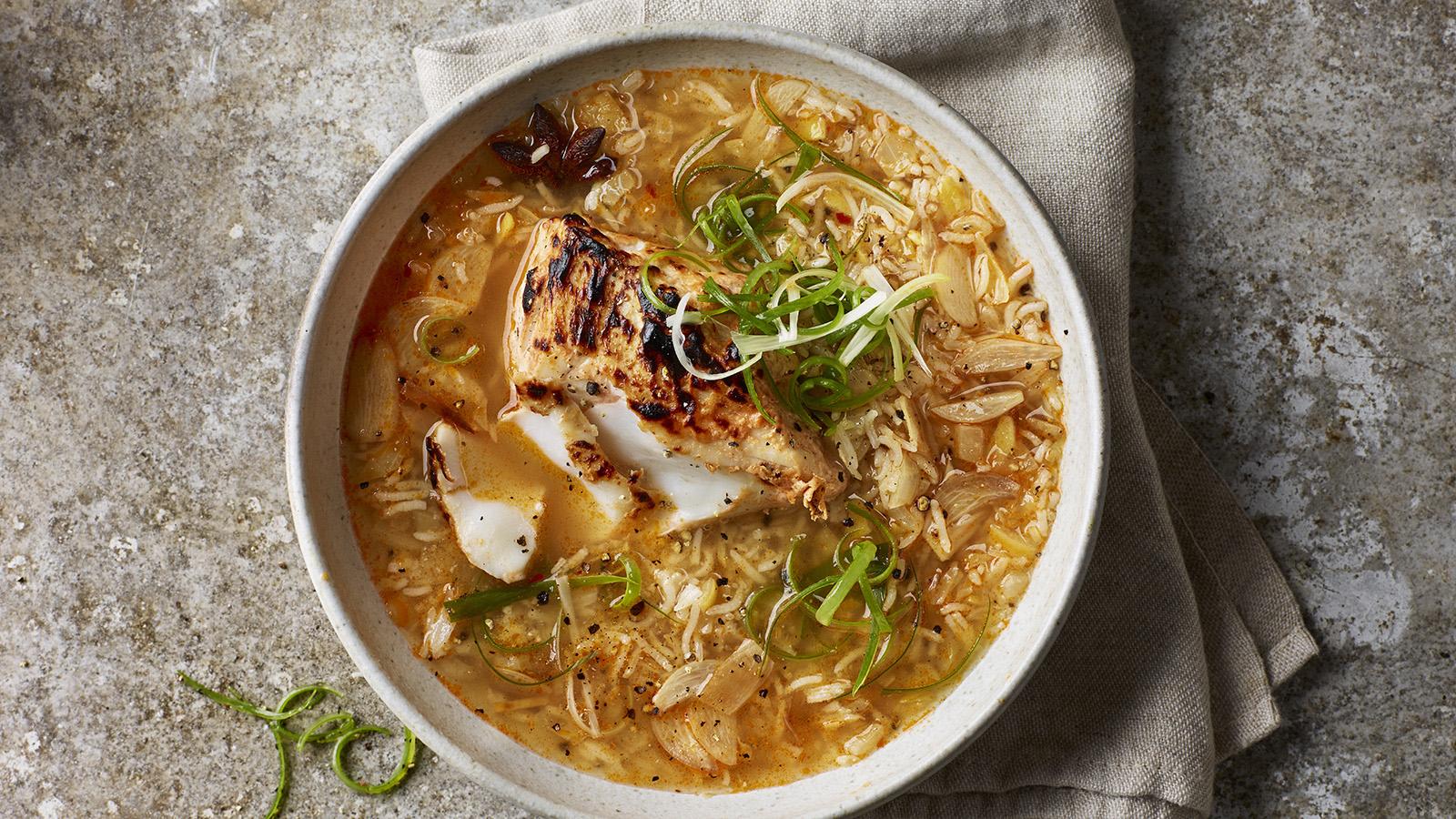 Harissa and yoghurt grilled cod with spiced broth and rice