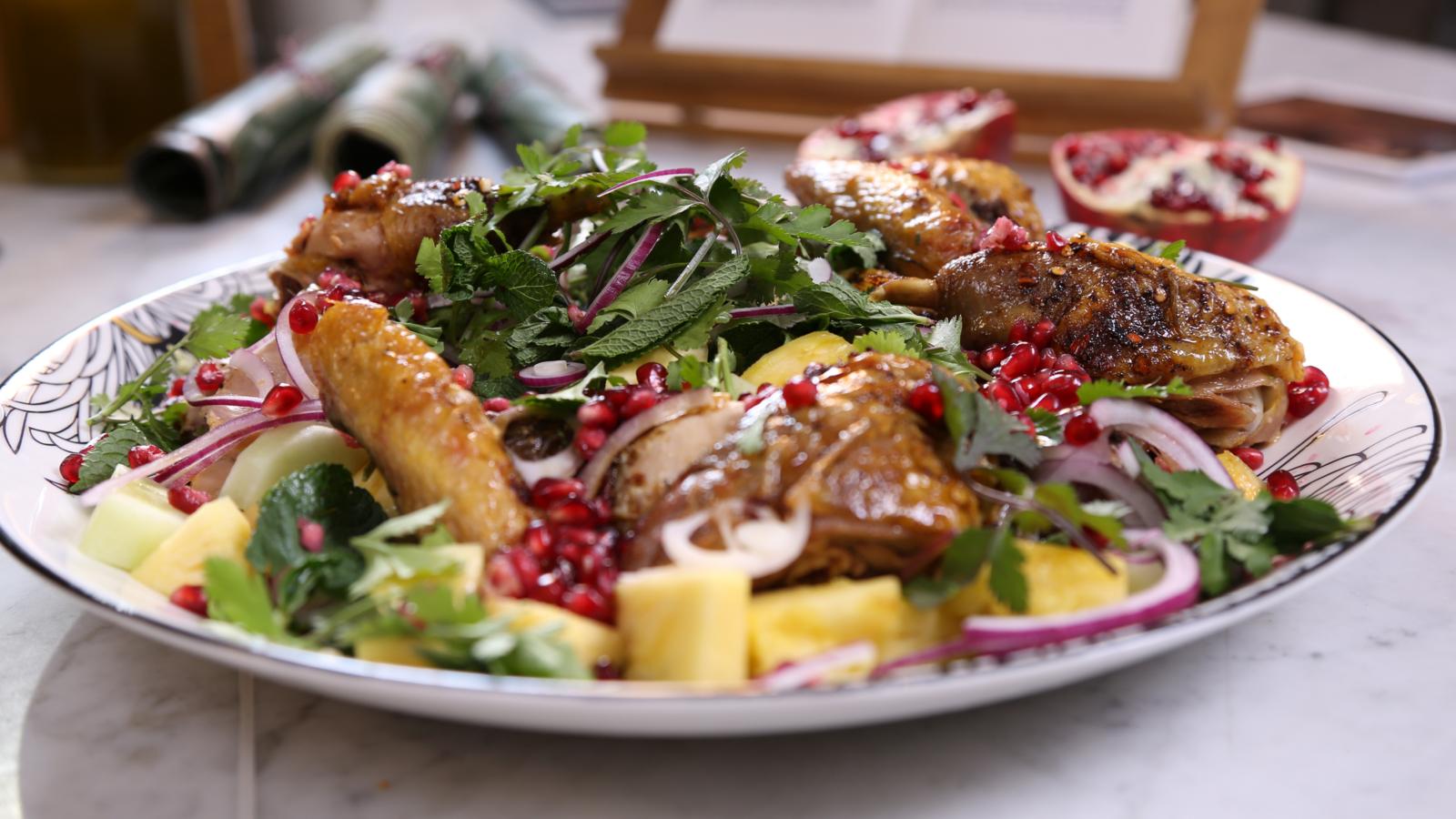 Honey-glazed guinea fowl with pomegranate and pineapple