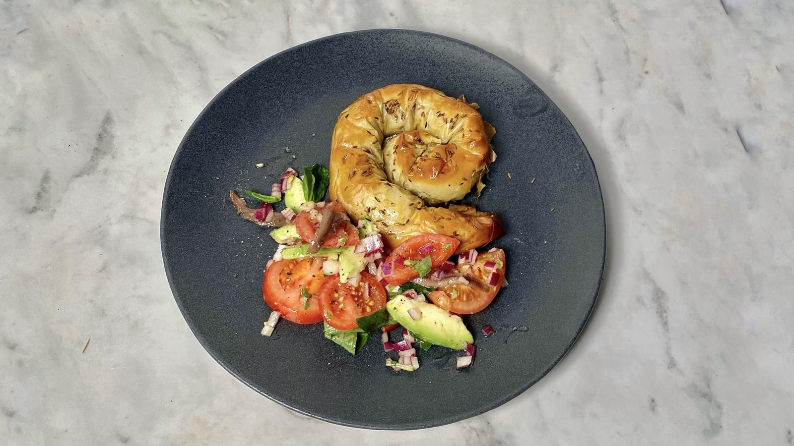 Little meat pies (kreatopites) with honeymoon tomatoes