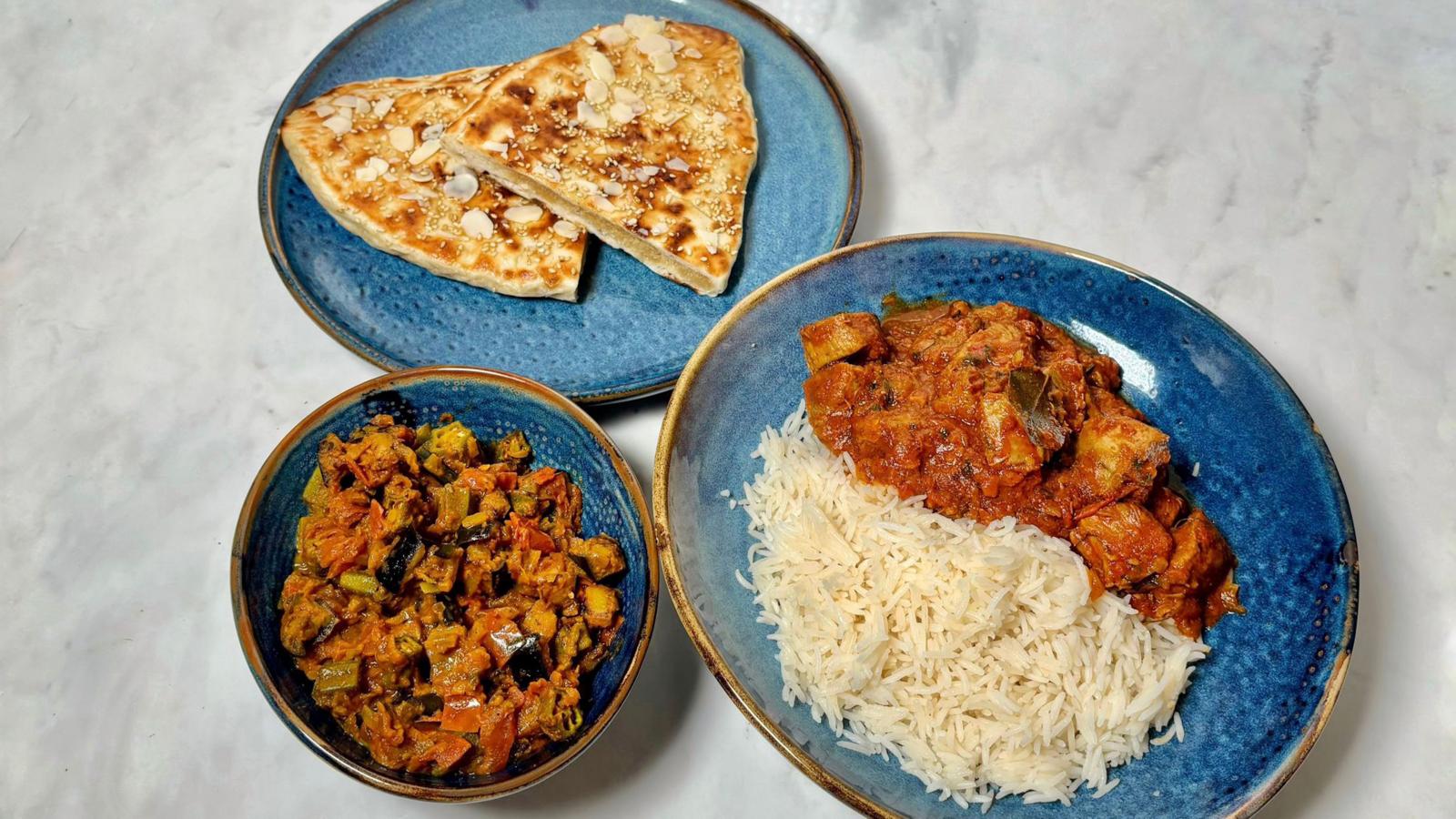 Lamb madras with okra bhindi and peshwari naan