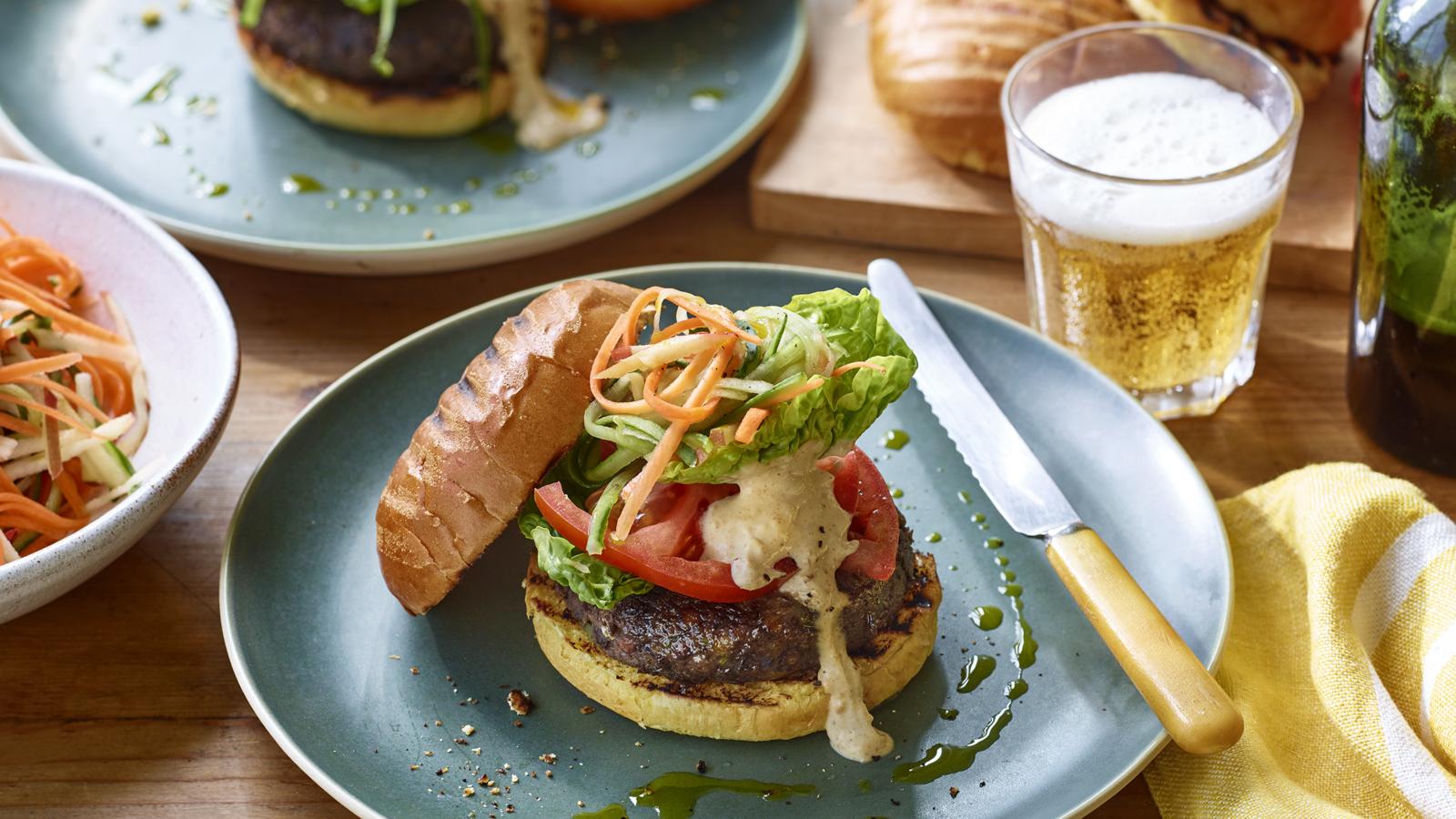 Lentil burgers with carrot pickle and peanut sauce