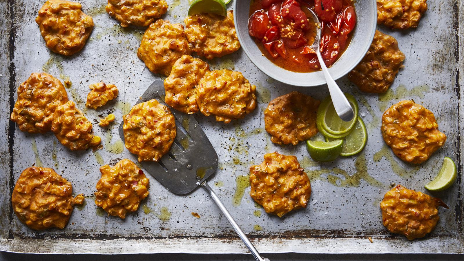 Lime and chilli sweetcorn fritters with roasted tomatoes