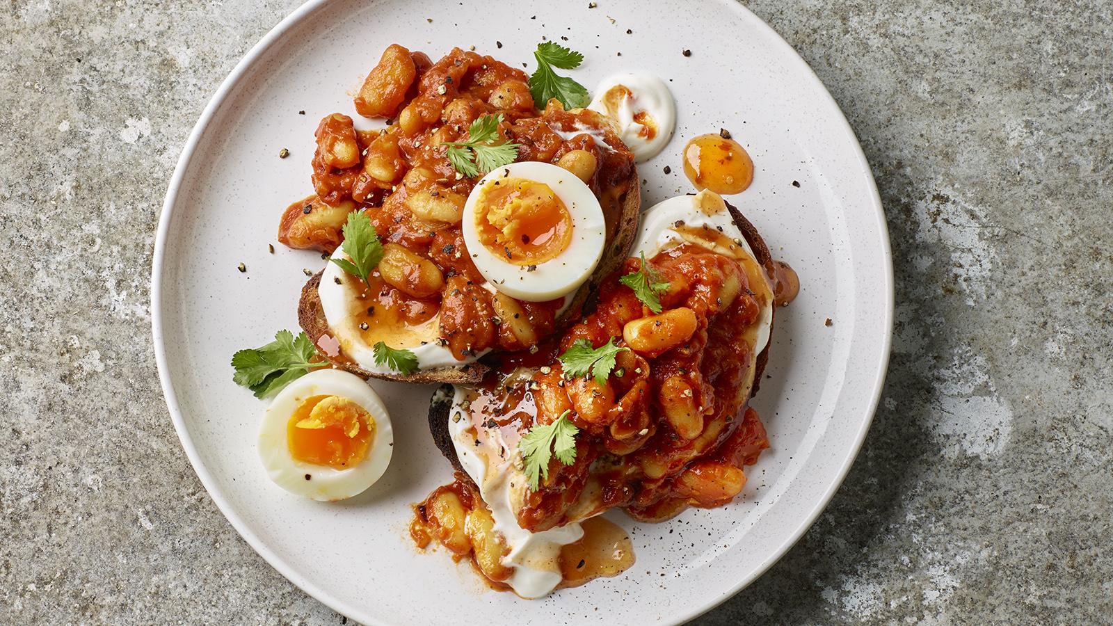 Masala beans with jammy eggs and mango chutney yoghurt