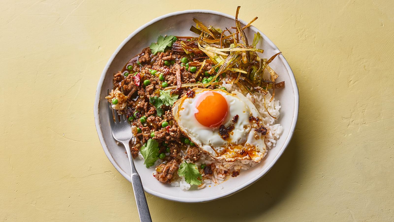 Mum’s braised beef mince with crispy fried leeks and eggs