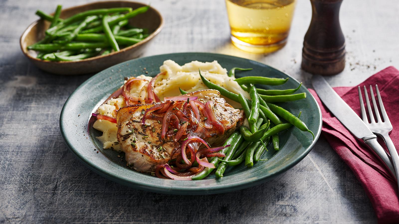 Roasted pork chop with rosemary and red onion 