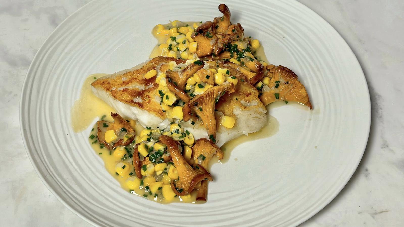 Roast cod with sweetcorn, chives and girolle butter sauce