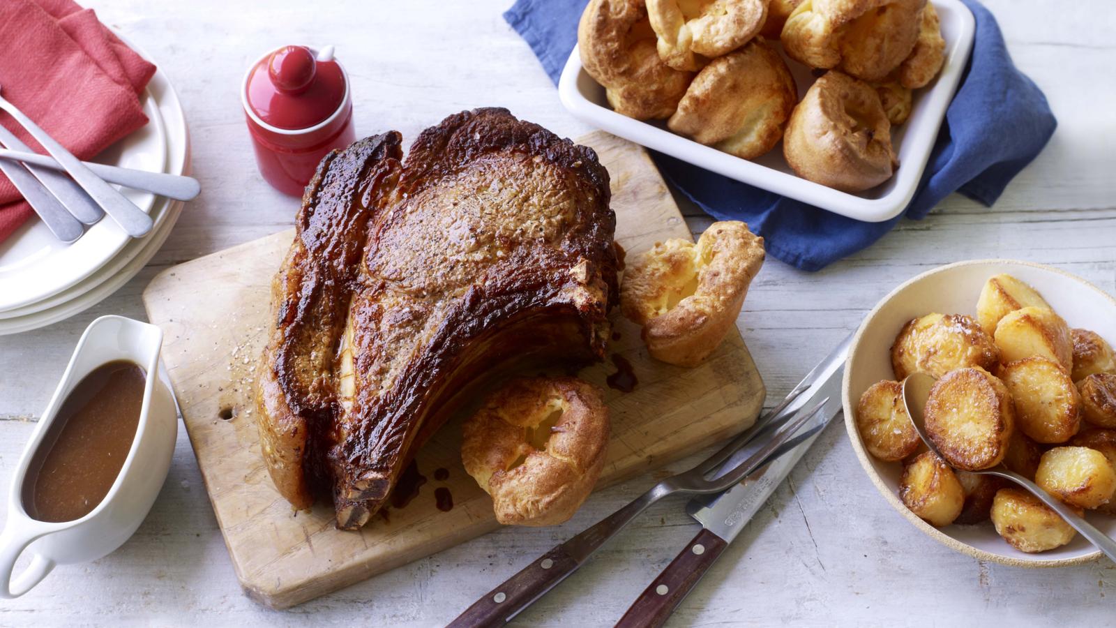 Roast rib of beef and bone marrow gravy with roast potatoes 