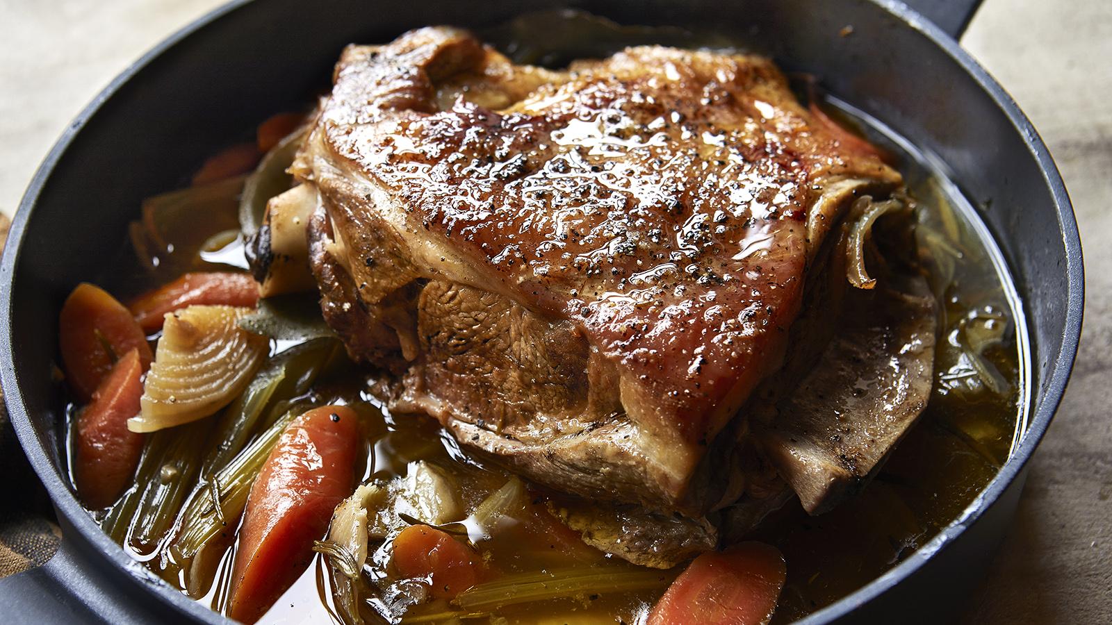 Slow-cooked lamb shoulder with carrots and beer