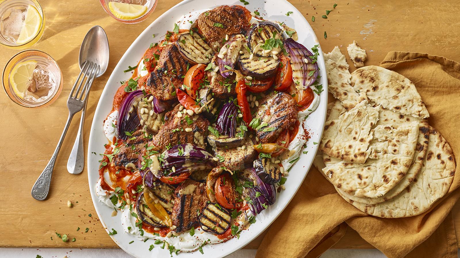 Spiced lamb chops and aubergines with labneh and tomato sauce