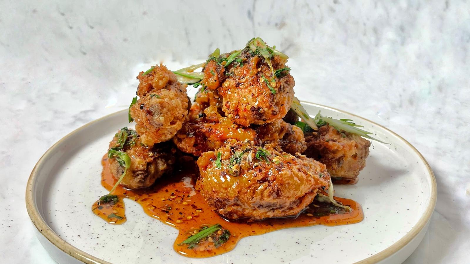 Triple crisp chicken wings with Sichuan glaze