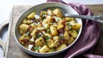 Crisp roast potatoes with honey and bacon recipe - BBC Food