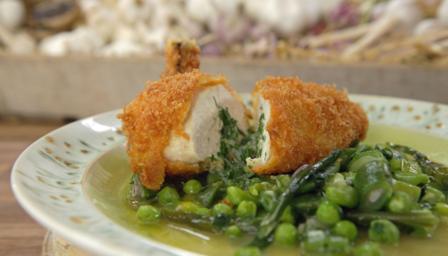 Classic chicken Kiev with spring vegetables