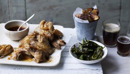 Smoky chilli chicken wings, spiced potato wedges and padron peppers