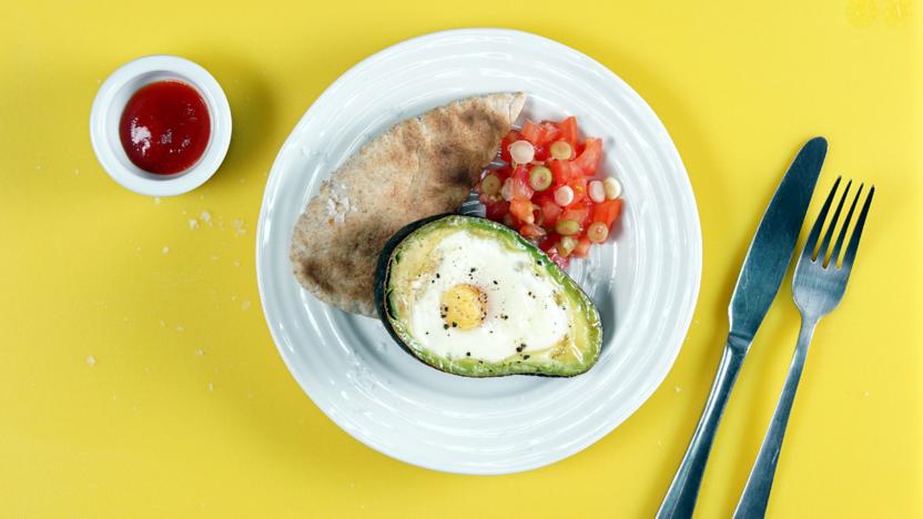 Baked eggs in avocado with pitta