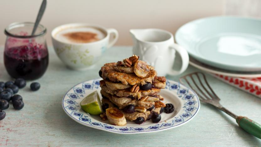 Vegan banana pancakes with blueberries and pecans