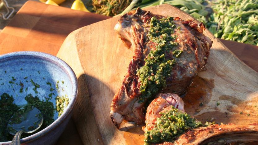 Barbecued veal chops with fresh herbs and salmoriglio
