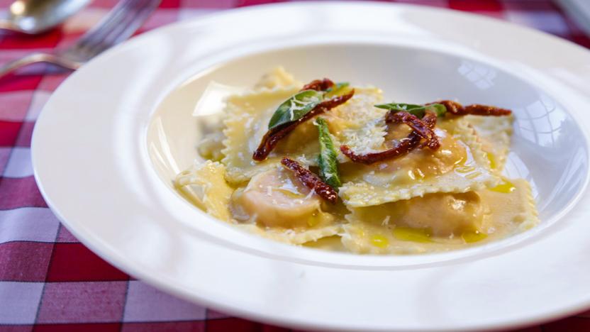 Butternut squash ravioli with fried sage leaves and sun-dried tomatoes