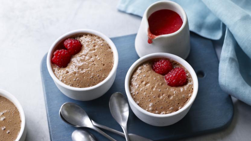 Chocolate and amaretto mousses with raspberry sauce