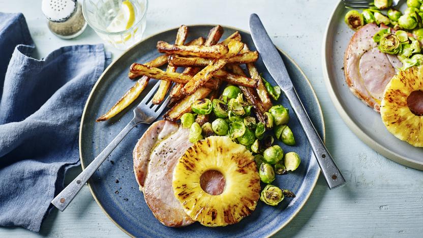 Gammon and chips with pineapple and greens