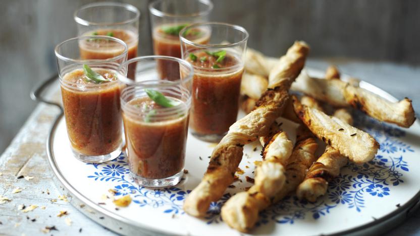 Gazpacho shots with pimenton and caraway seed twists