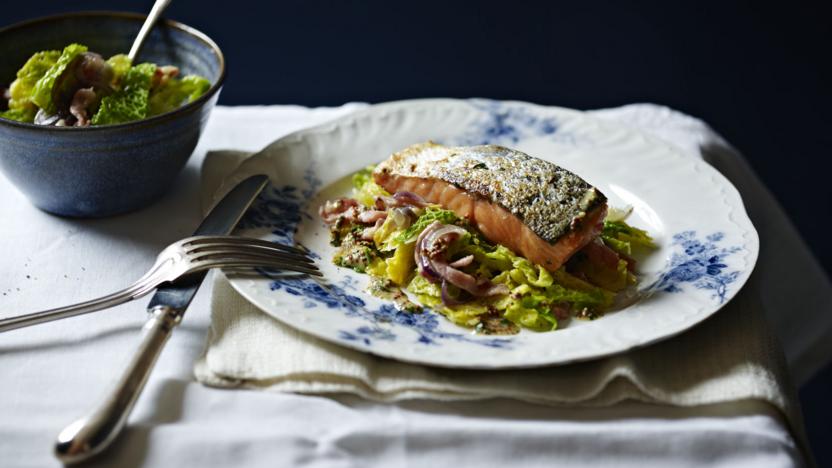 Grilled salmon, braised cabbage with bacon and onions