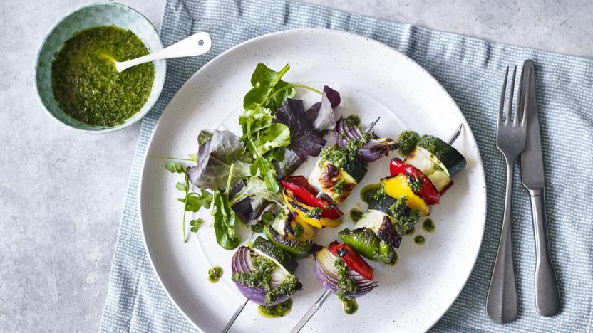 Grilled vegetable and halloumi skewers with warm salsa verde