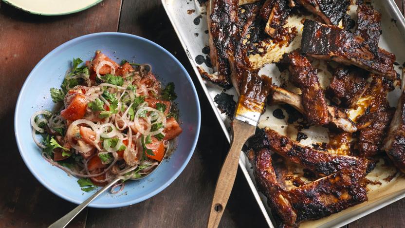 Sweet sticky spicy ribs with red onion salad