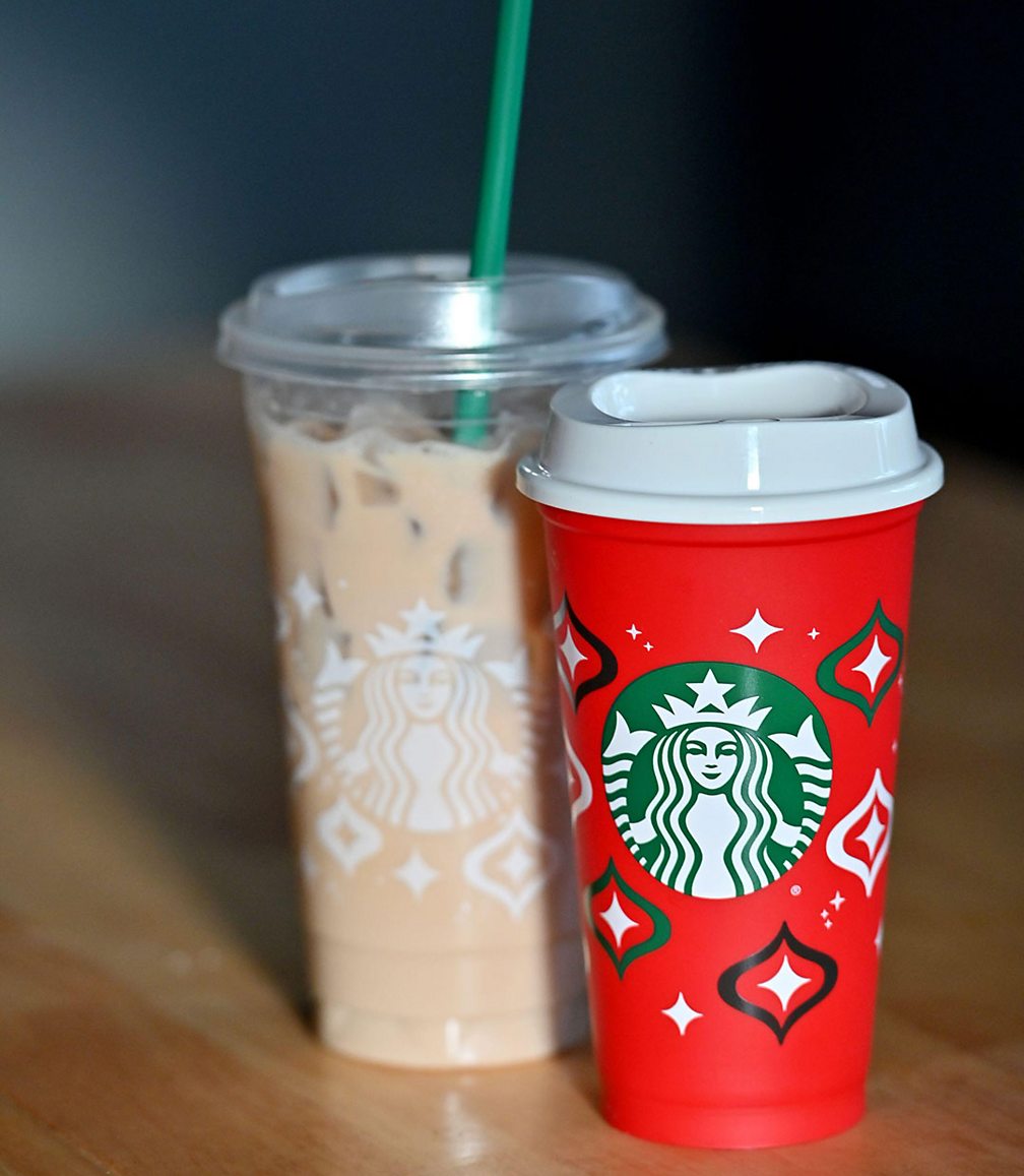 Alamy Red Cup Day marks the kick-off to Starbucks's lucrative holiday season, and attracts millions of customers for a free, reusable festive cup (Credit: Alamy)