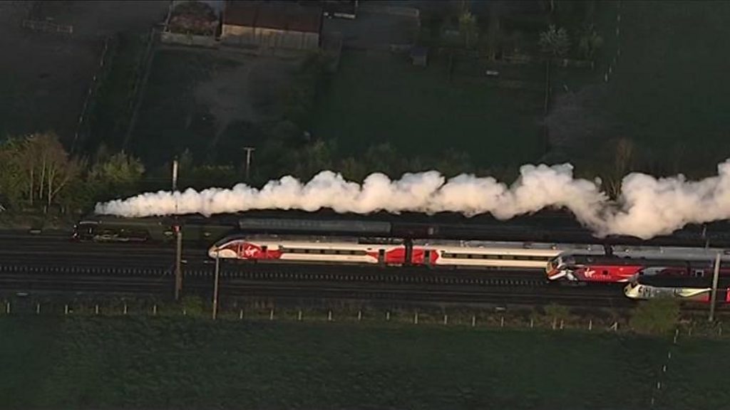 The Flying Scotsman and Virgin Trains' new Azuma travel in the same direction alongside two of the rail operator's present day fleet