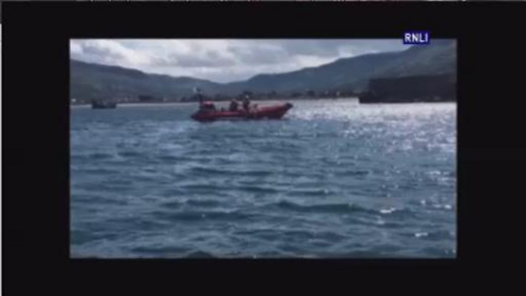 County Antrim rescue: Men found clinging to capsized kayak