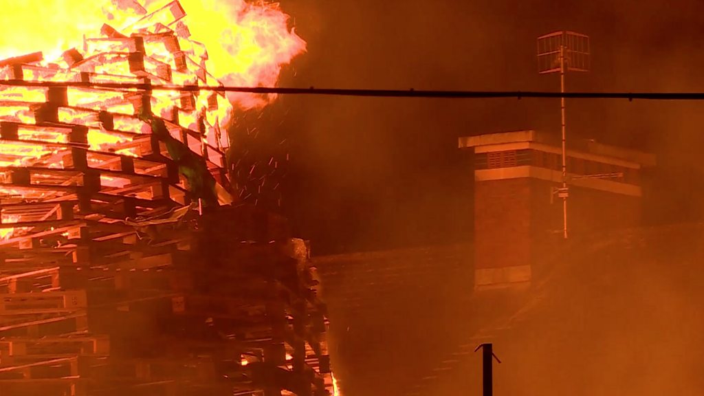 Belfast homes boarded up ahead of Eleventh night bonfire - BBC News