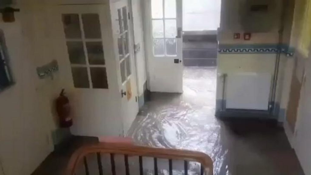 Flood damage after severe storms hit north Wales - BBC News