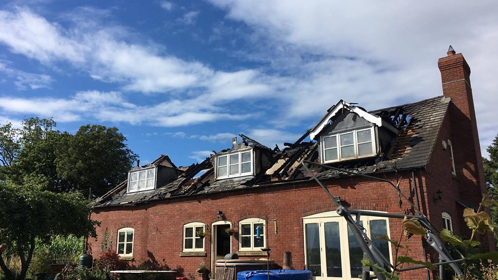 Fire after house 'struck by lightning' near Stafford. BBC News