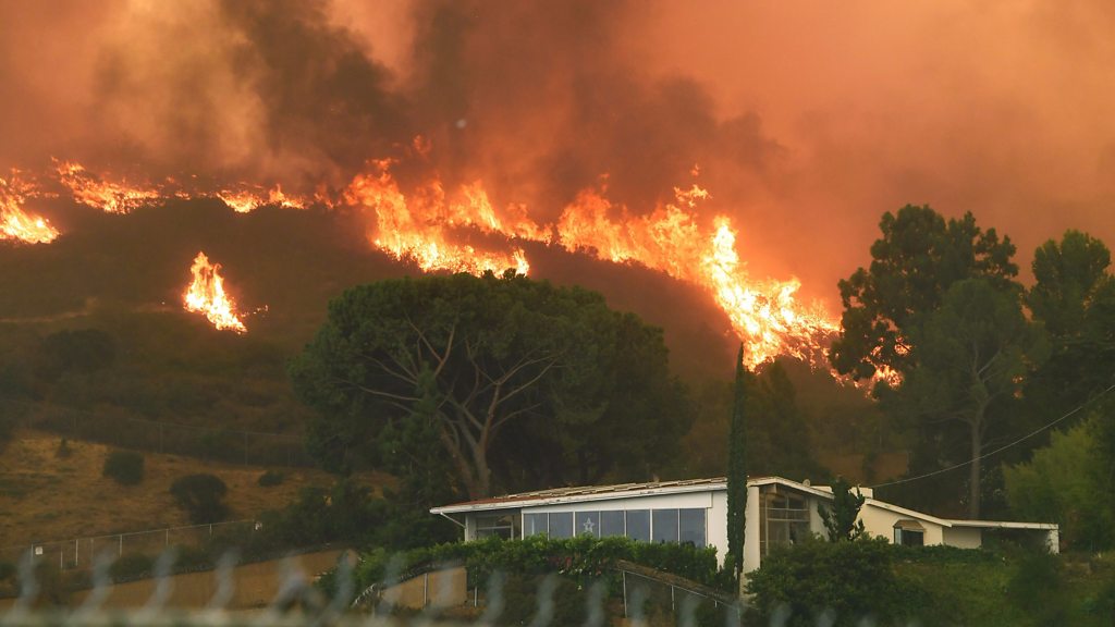 Image result for Los Angeles residents allowed to return home as blaze appears to ease