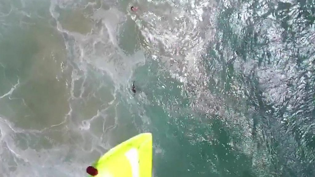 Drone saves teen swimmers in world first