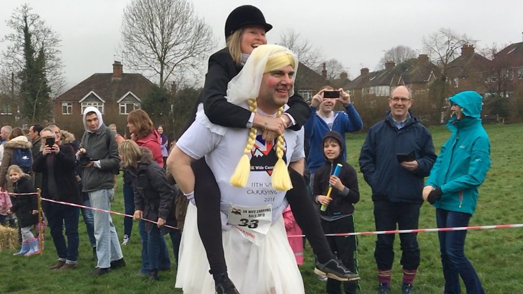 Uk Wife Carrying Contest Takes Place In Dorking Bbc News