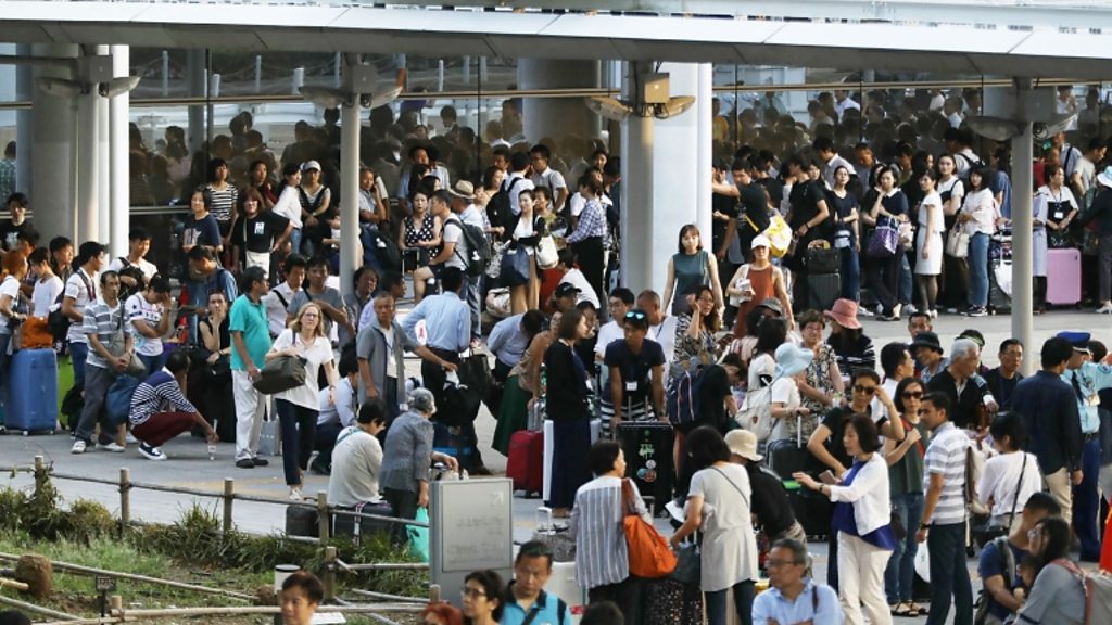 Typhoon damage shuts key Japan airport