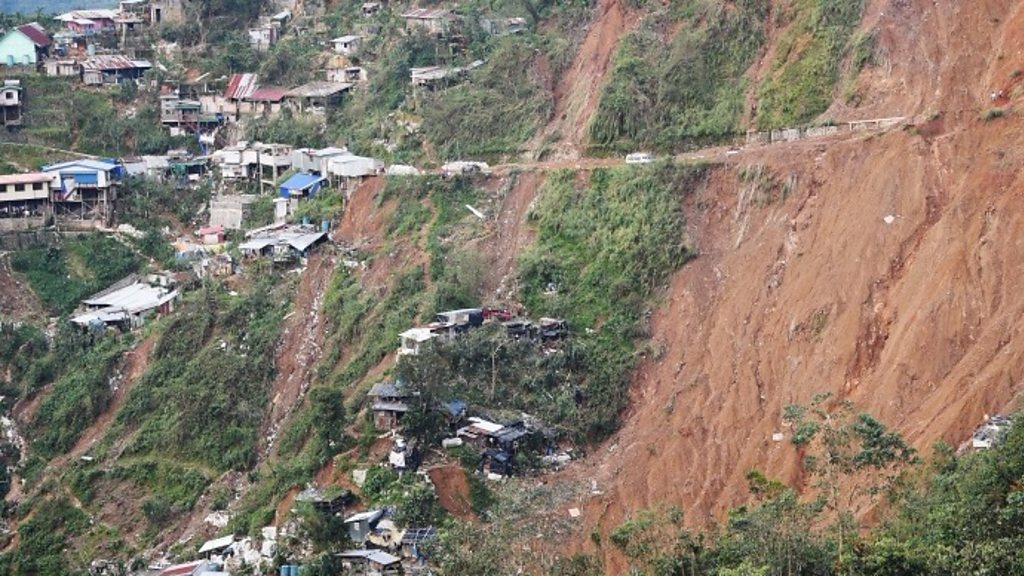 Dozens buried by typhoon landslide