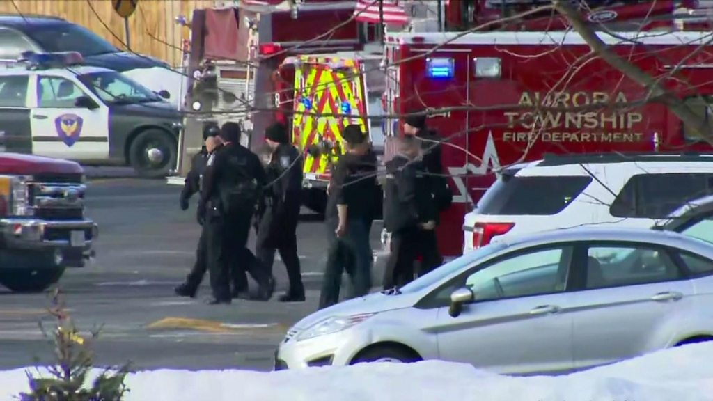 Police officers at the scene in Aurora, Illinois
