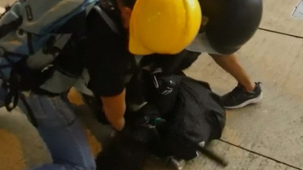 Hong Kong protests: Police defend use of 'disguised' officers
