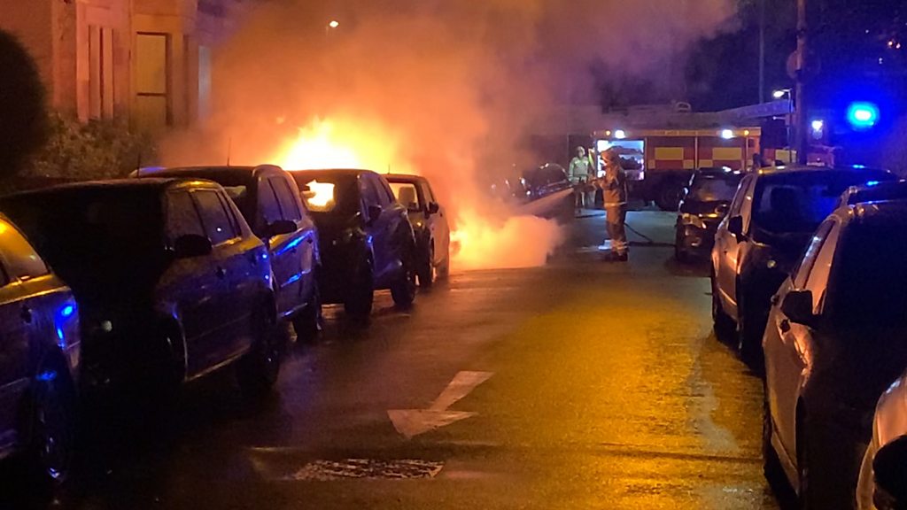 BMW deliberately set on fire on Glasgow street - BBC News