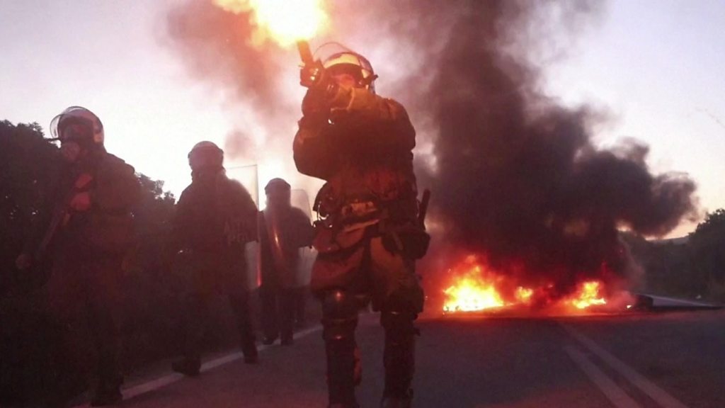 Greek clashes break out over new migrant camps