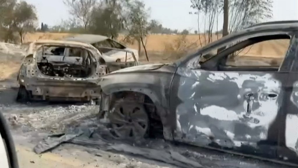 Destroyed cars line road near festival in chilling video