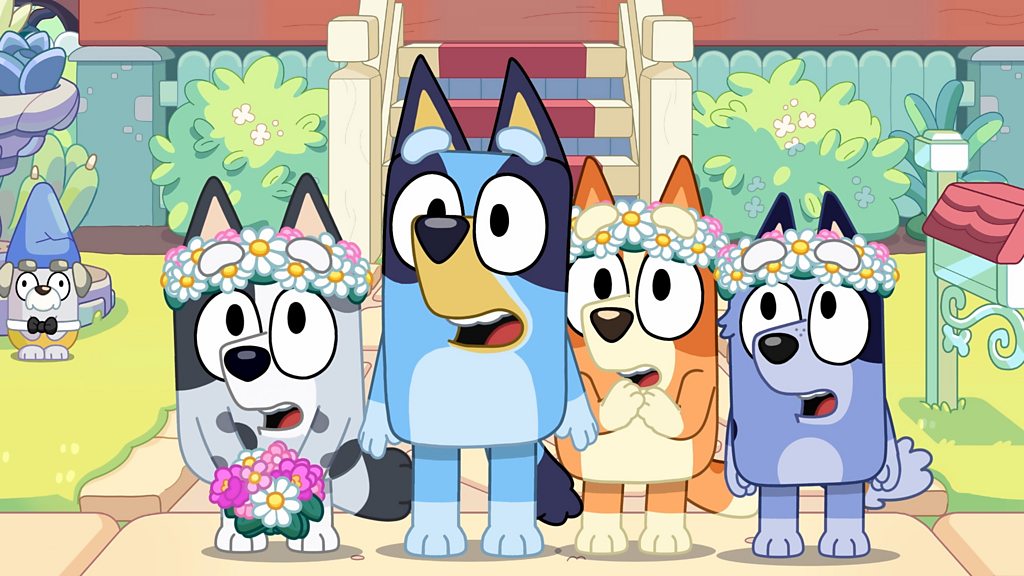 A still of Bluey, Bingo, Muffin and Socks as wedding flower-girls in kids' TV series Bluey